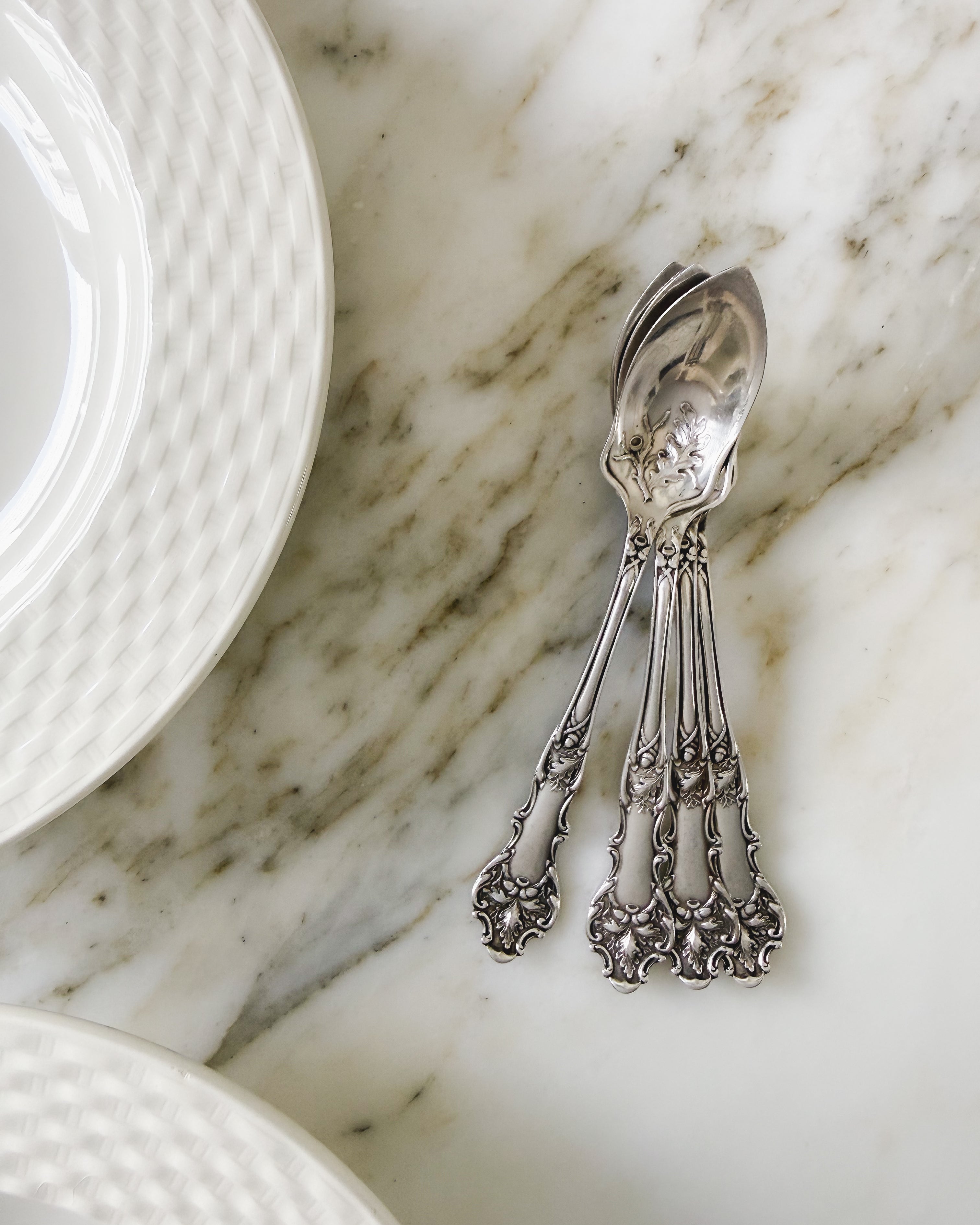 Antique silver grapefruit spoon set in oak pattern