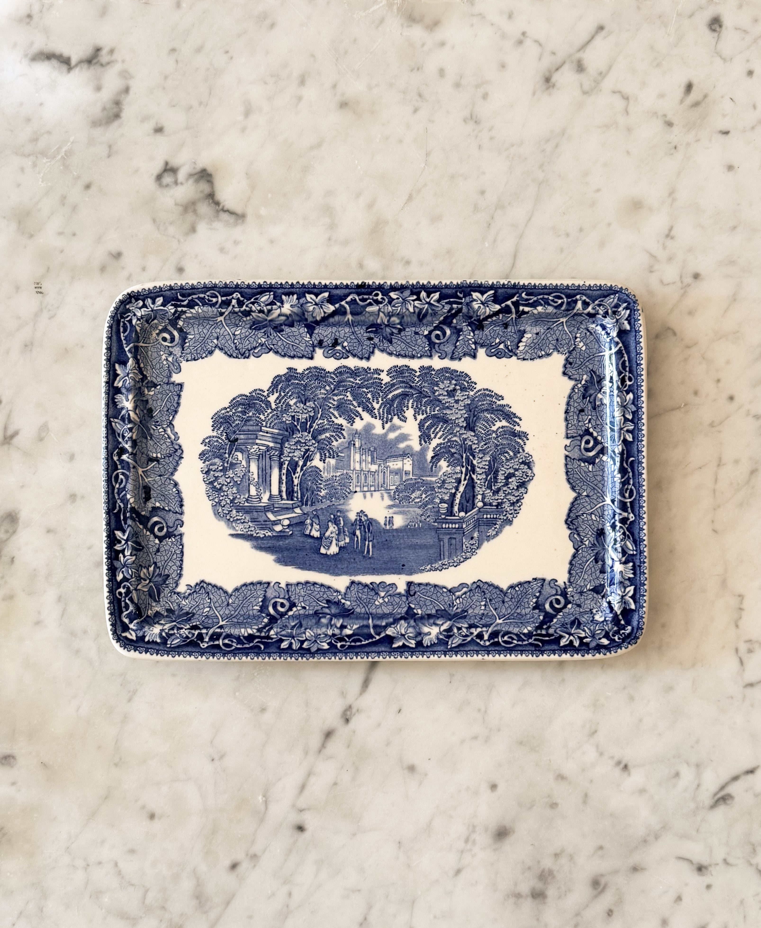 Vintage English Blue & White Rectangular Transferware Tray On top of a marble counter