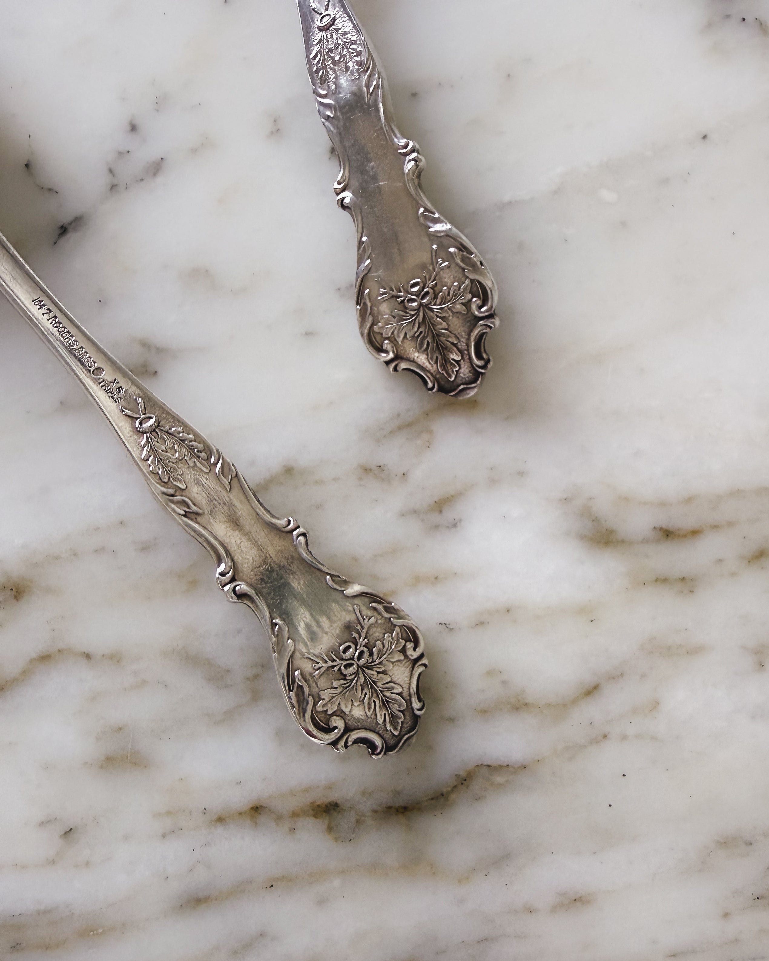Antique silver grapefruit spoon set in oak pattern