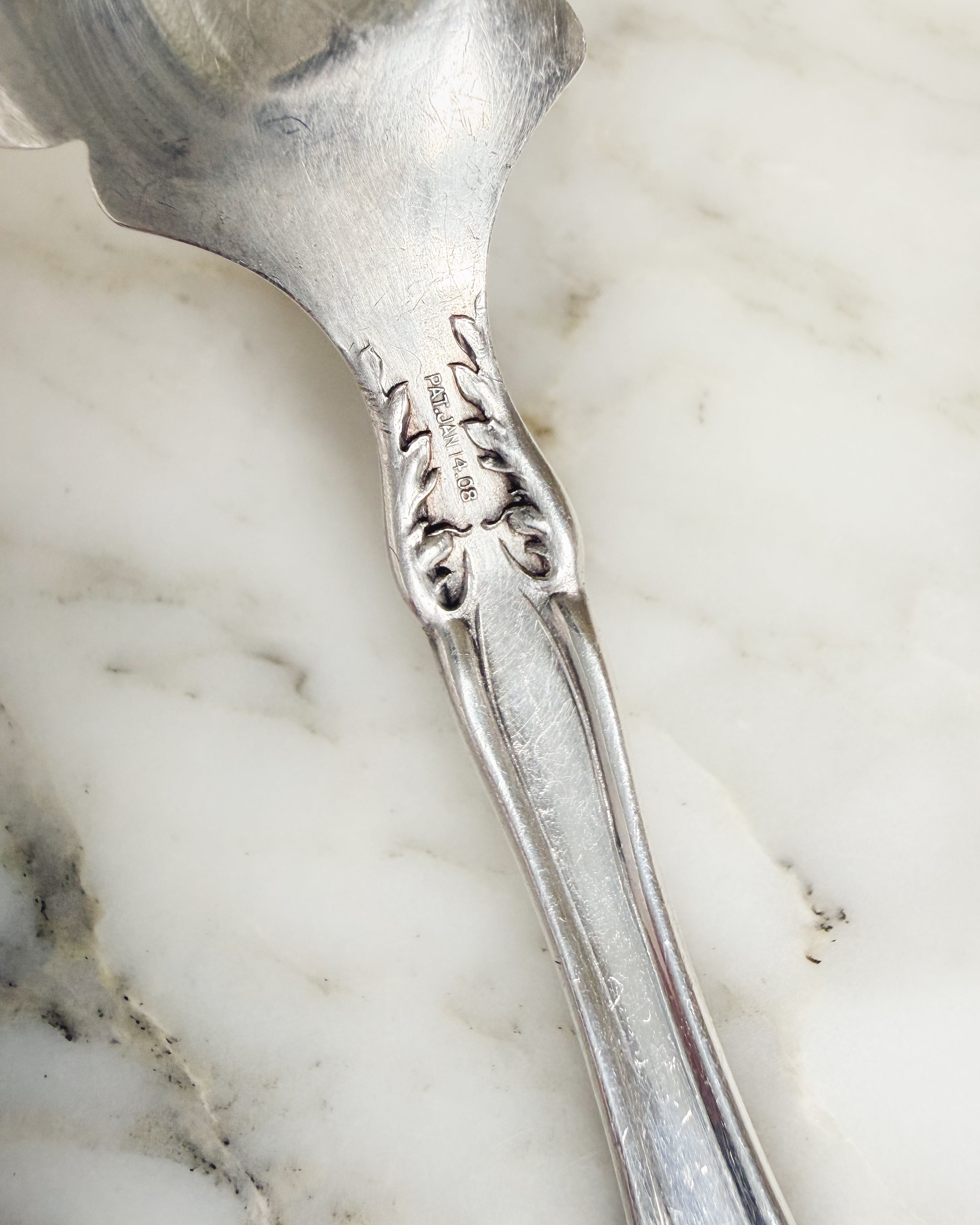 1908 patent date mark on antique Edwardian silver serving spoon.